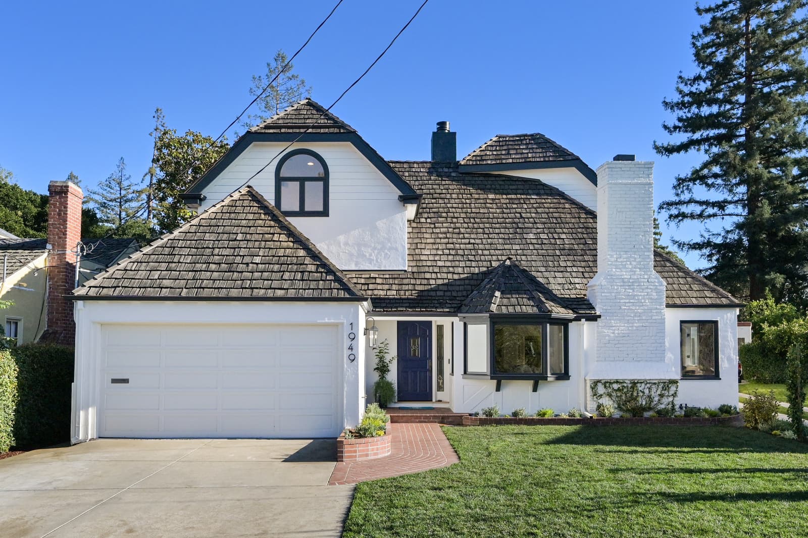White cottage exterior painting